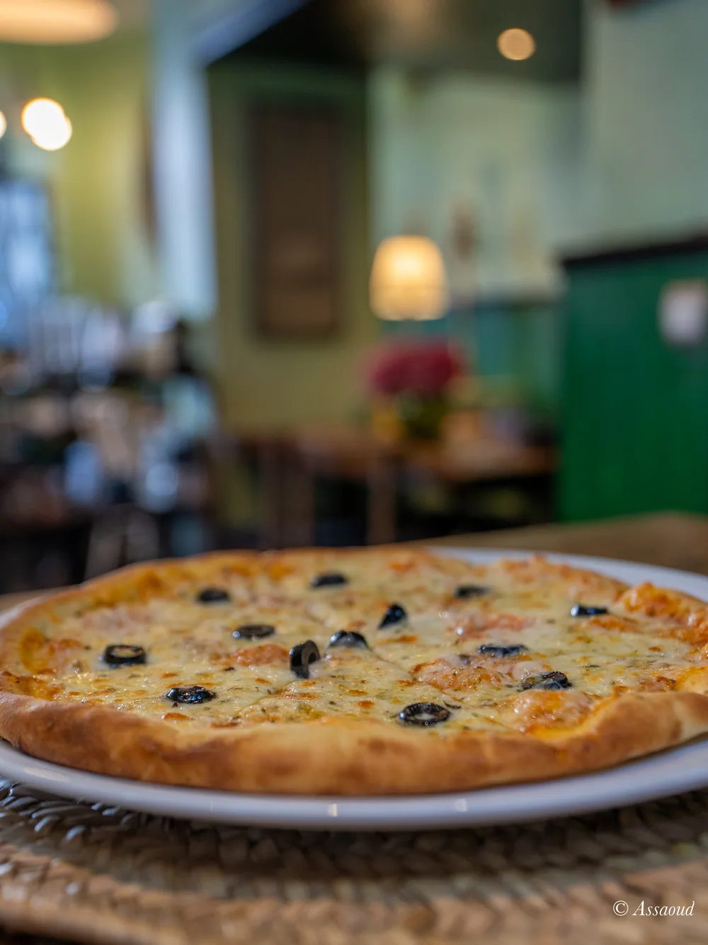 Fresh pizza served at Mandala Pizzeria in Chefchaouen